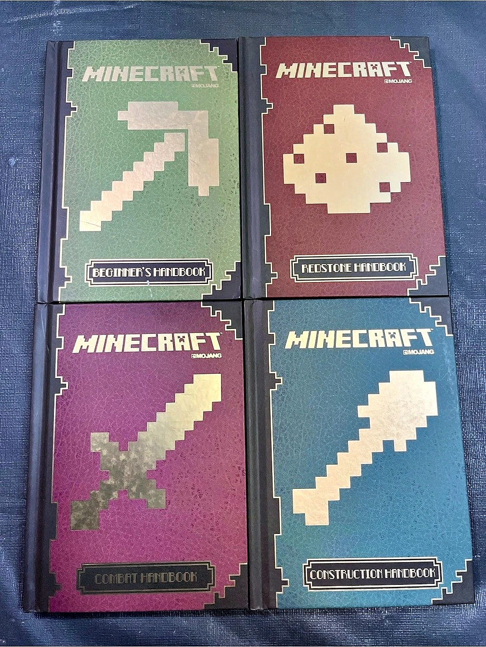 Minecraft The Complete Handbook Collection lot of 4 Hardcover Book Set Mojang